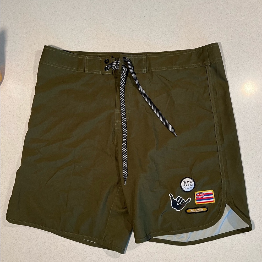 Recycled ocean plastic polyester and spandex blend board shorts. New never worn